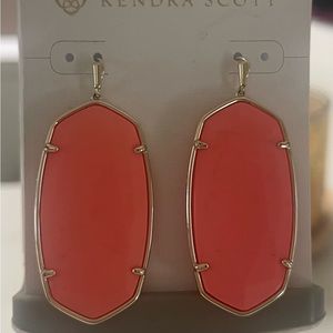 Kendra Scott Gold Faceted Daniel’s Earrings in Bright Coral Magnesite.